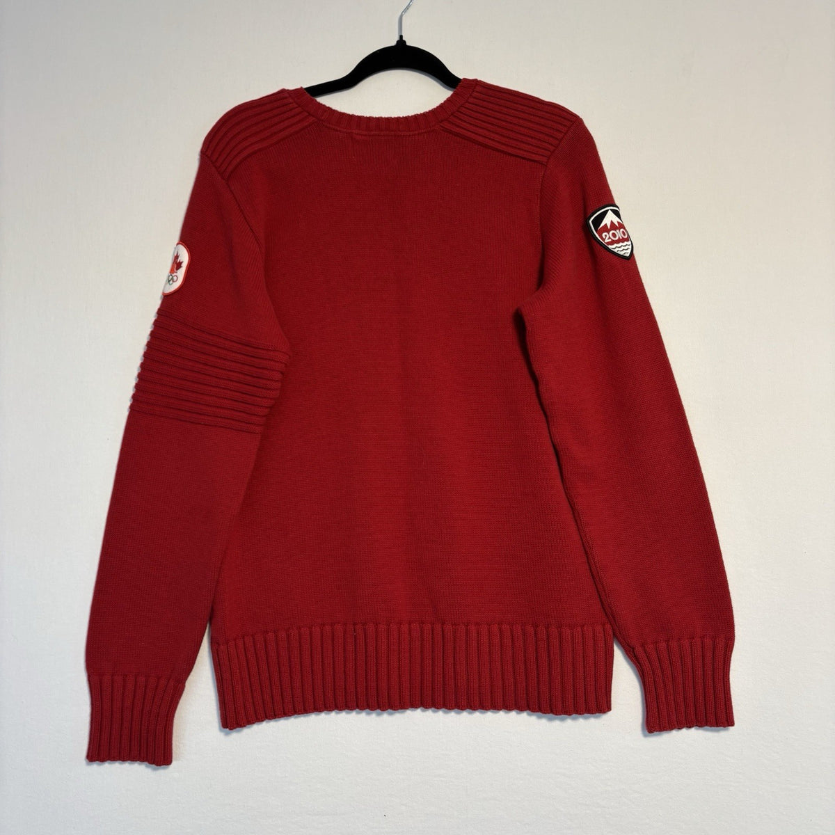 Hudson's Bay Team Canada Red Knit Sweater: Back view on hanger