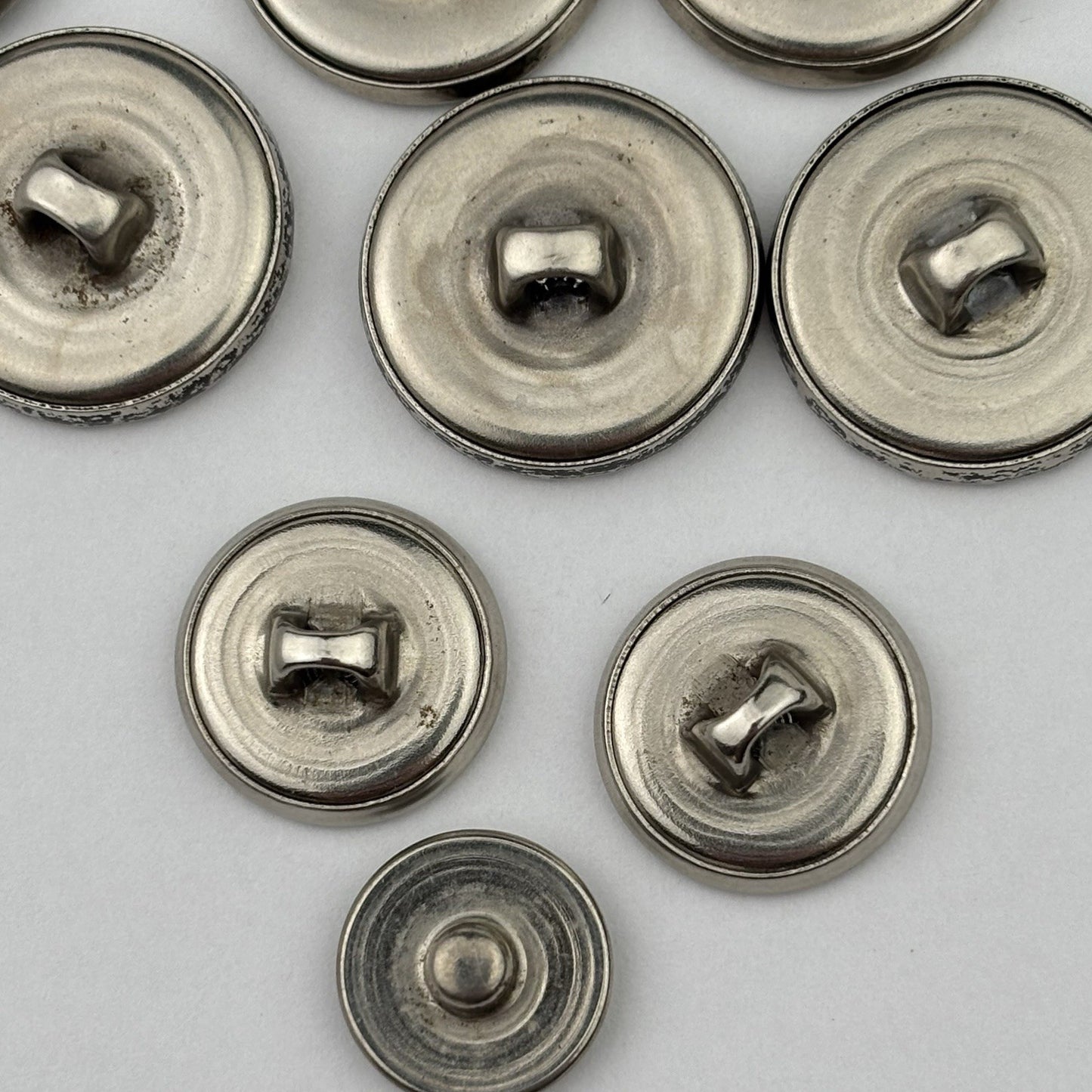 Vintage Silver Crest Button Lot – Fleur-de-Lis, Maple Leaf, Crown & Star, 15pcs