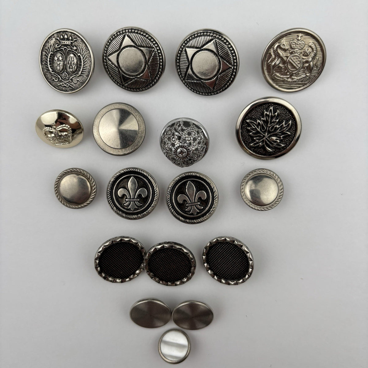 Vintage Silver Crest Button Lot – Fleur-de-Lis, Maple Leaf, Crown & Star, 15pcs