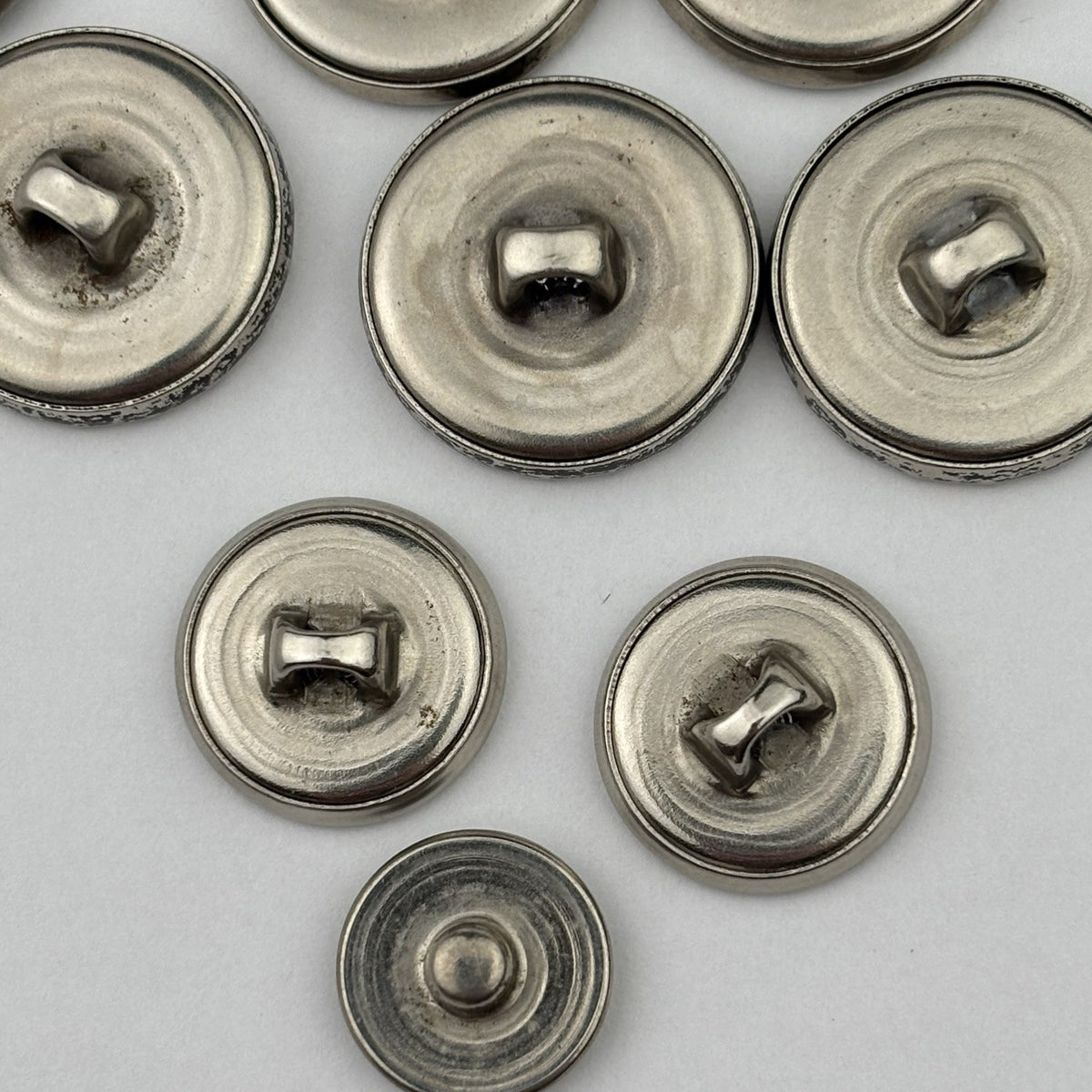 Vintage Silver Crest Button Lot – Fleur-de-Lis, Maple Leaf, Crown & Star, 15pcs