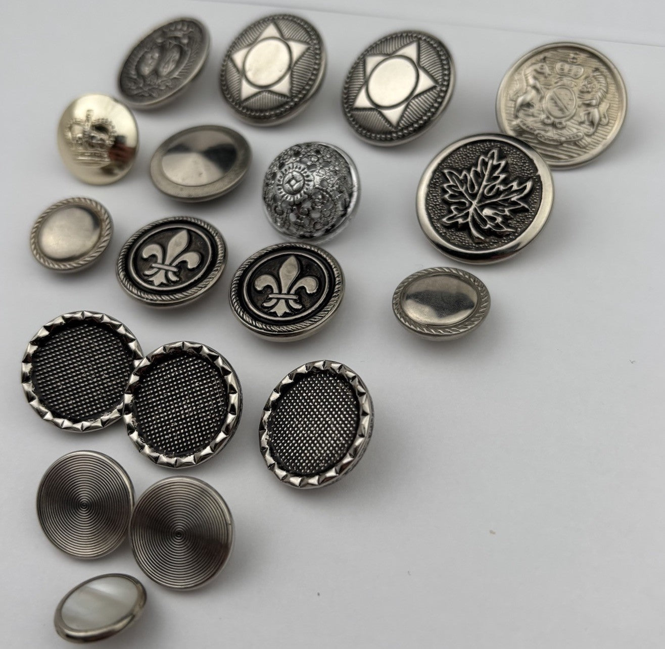 Vintage Silver Crest Button Lot – Fleur-de-Lis, Maple Leaf, Crown & Star, 15pcs