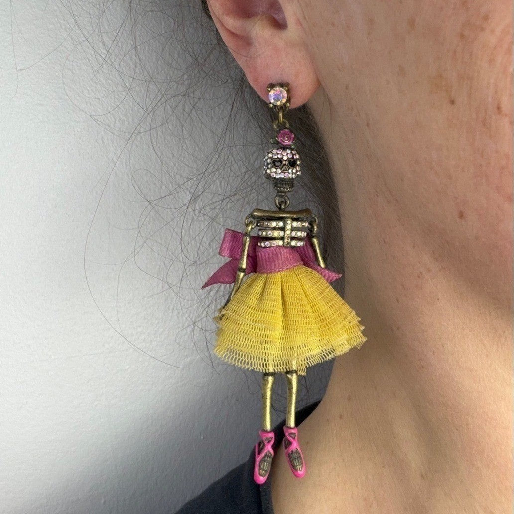 Betsey Johnson skull ballerina and heart earrings — close-up detail