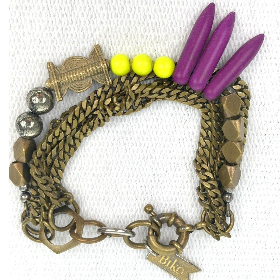 Biko Brass Tone Beaded Charm Bracelet — front view